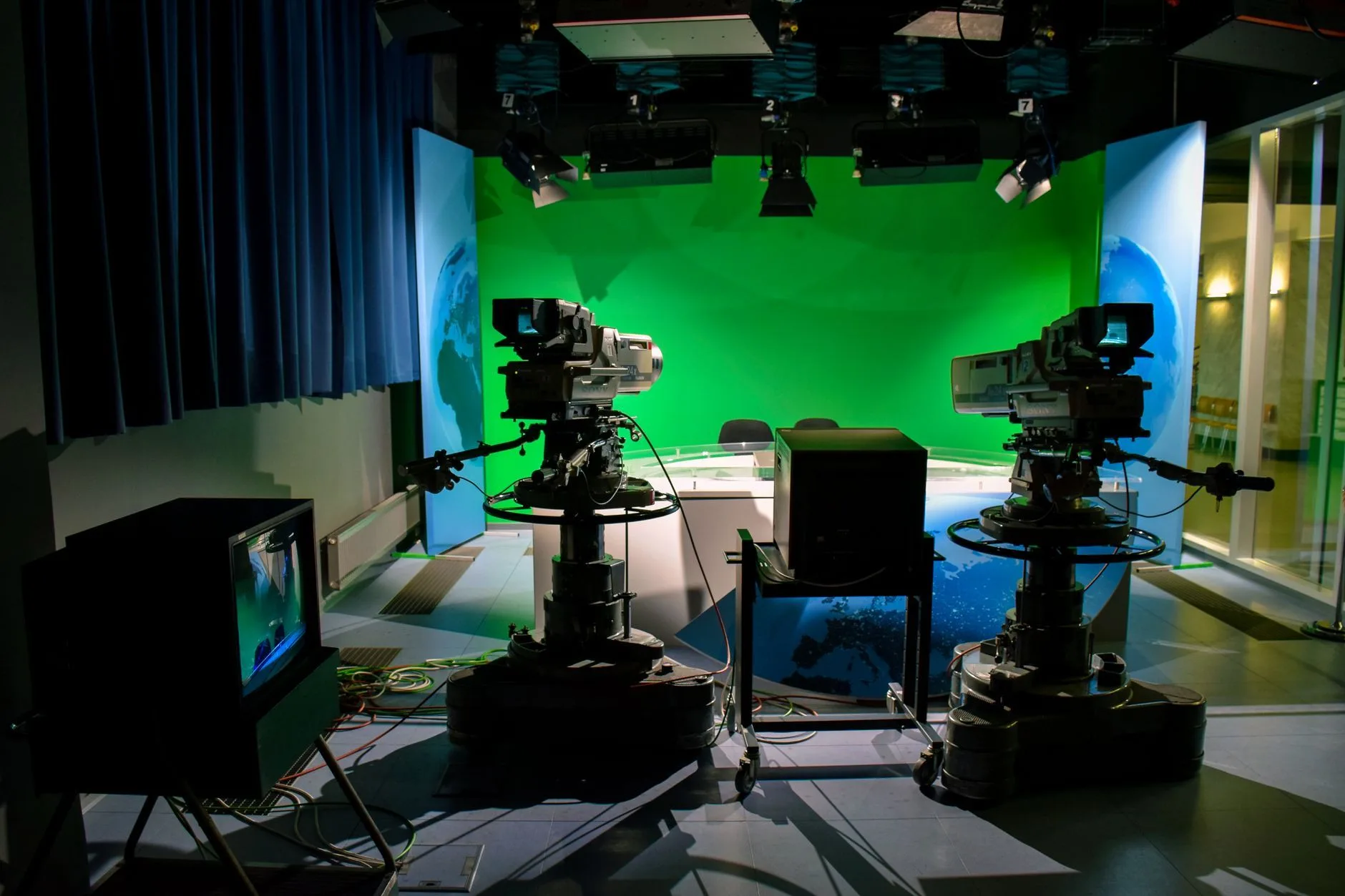 Live streaming host presenting to camera in a studio